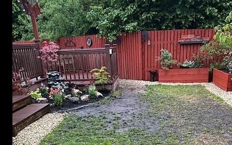 Patchy, muddy lawn before artificial grass restoration